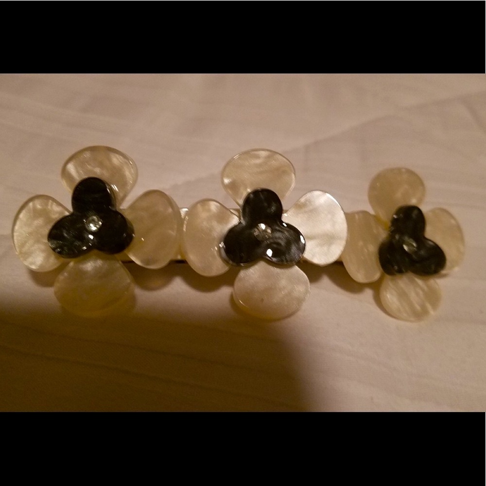 White and black barrette